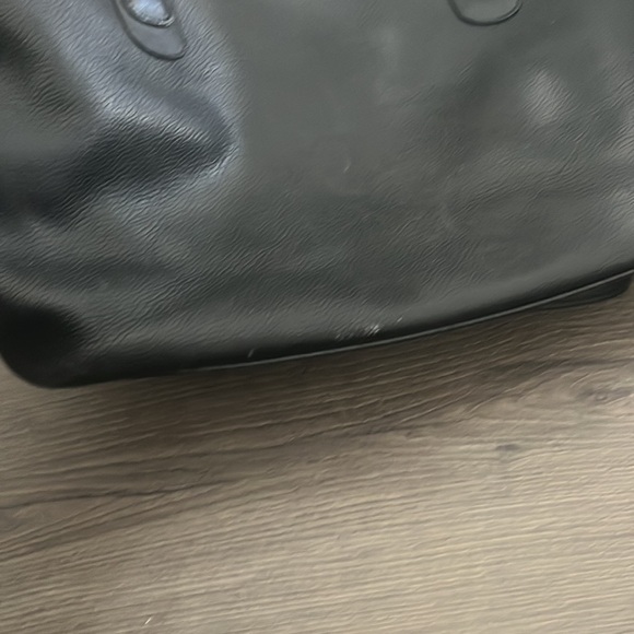 Tiffany and Co. leather handbag in good condition. Gold hardware Zipper closure